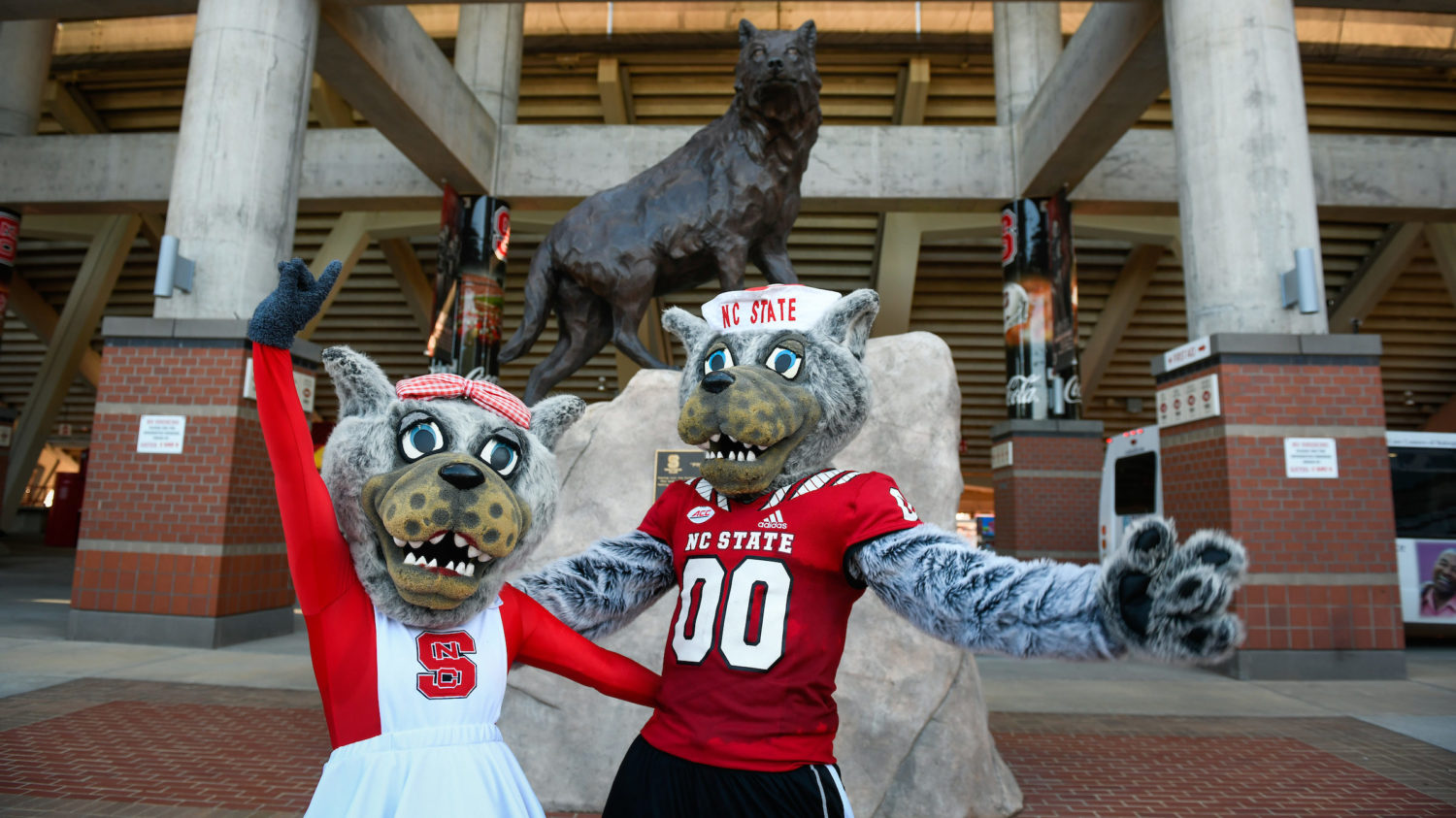 Mr. and Ms. Wuf outside Carter Finley stadium