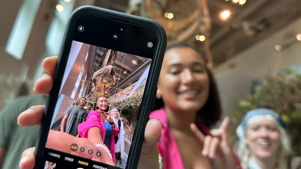 Students snap a selfie while exploring a museum in downtown Raleigh.