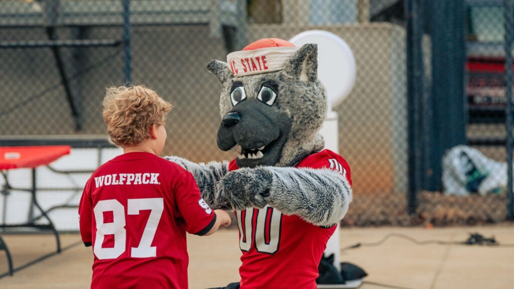young boy with Mr. Wuf