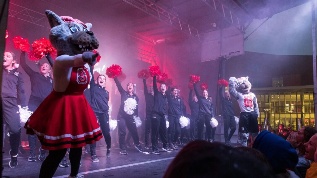 dancers and Mr. and Ms. Wuf on stage at RWW 2021 Pep Rally
